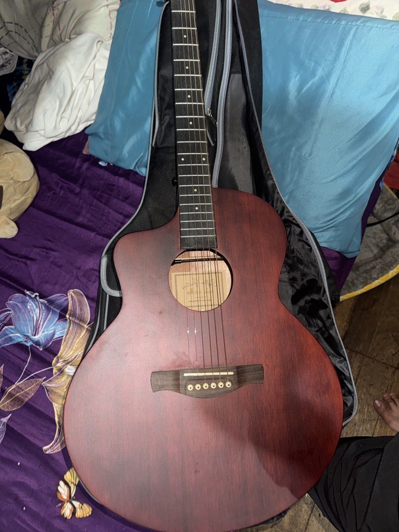 Cliffton Guitar Burgundy (Category: Musical Instruments) located in Caloocan City. Submitted by jasonmanuel (Listing ID 1458146915, Image 2). Description: Never been used. Tuned lang. Bought 9,500 With port With auxiliary cord With capo With extra string Negotiable.