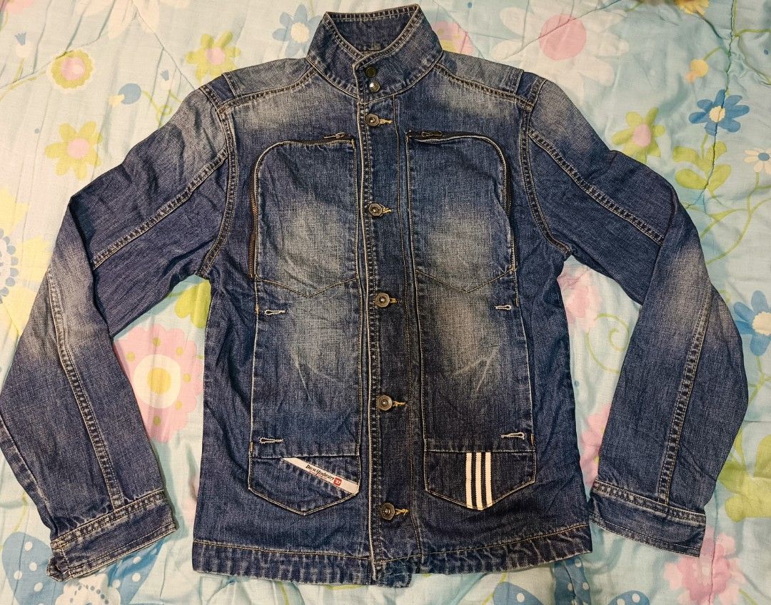 Diesel x Adidas denim jacket (Category: Coats, Jackets and Outerwear) located in Angeles City. Submitted by al.quilala03 (Listing ID 1458216905, Image 1). Description: off/legit no wash tag L-26 1/2 inch W-19 inch Sleeve length-25 inch excellent condi see pic before buying🙏.