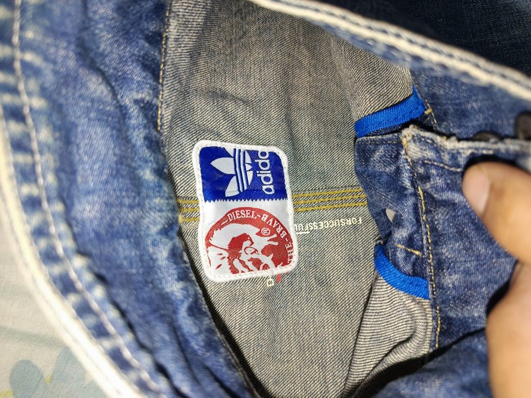 Diesel x Adidas denim jacket (Category: Coats, Jackets and Outerwear) located in Angeles City. Submitted by al.quilala03 (Listing ID 1458216905, Image 3). Description: off/legit no wash tag L-26 1/2 inch W-19 inch Sleeve length-25 inch excellent condi see pic before buying🙏.