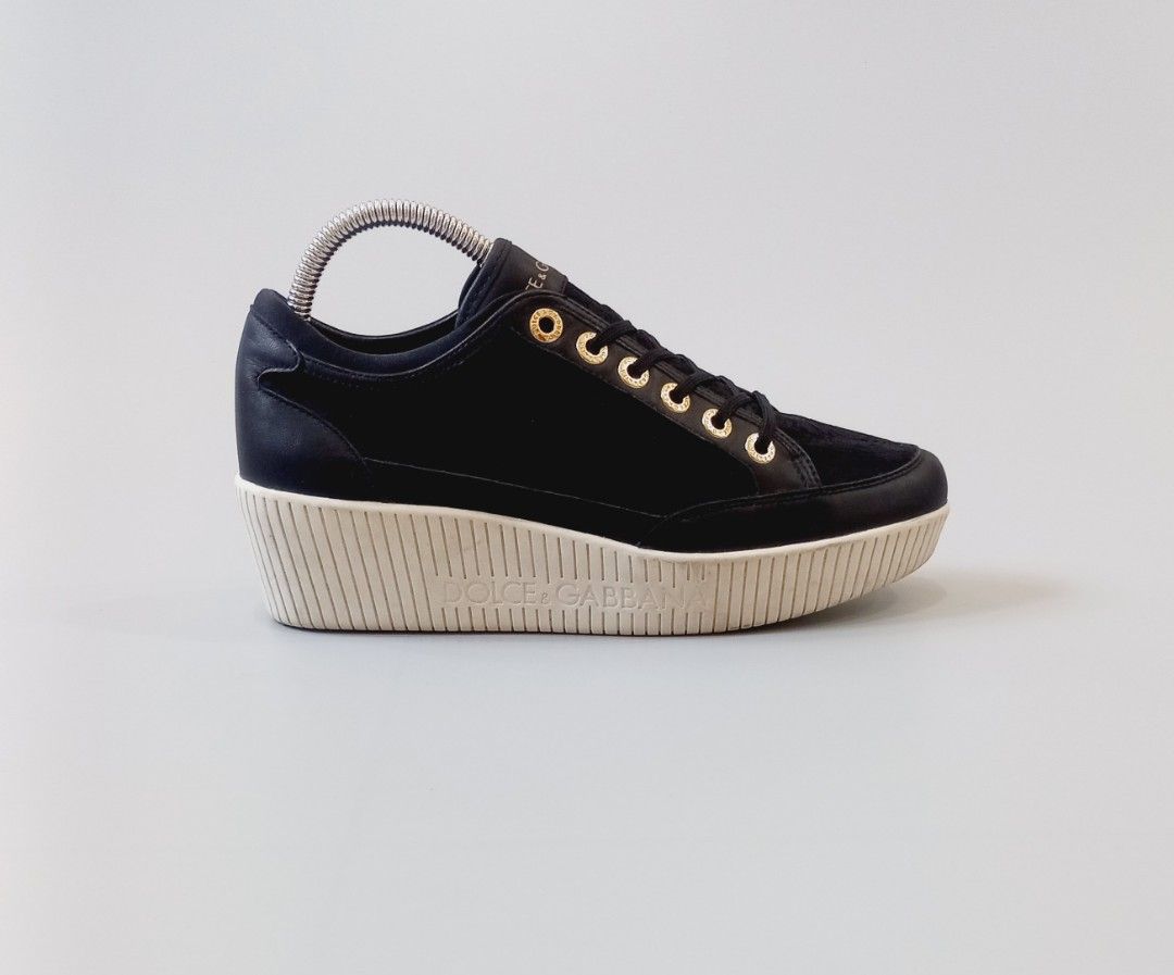 Dolce & Gabbana Black Wedge Sneakers (Category: Sneakers & Footwear) located in Cebu City. Submitted by MrLiks_123 (Listing ID 1458181258, Image 1). Description: Dolce & Gabbana wedge lace-paneled distinctive ribbed platform sole and gold-tone eyelets Size 38½ / 24 cm Used, in great well-Maintained condition Cebu location Dm 📍 ********************************** Original Retail Price: When brand new, platform sneakers from Dolce & Gabbana’s mainl