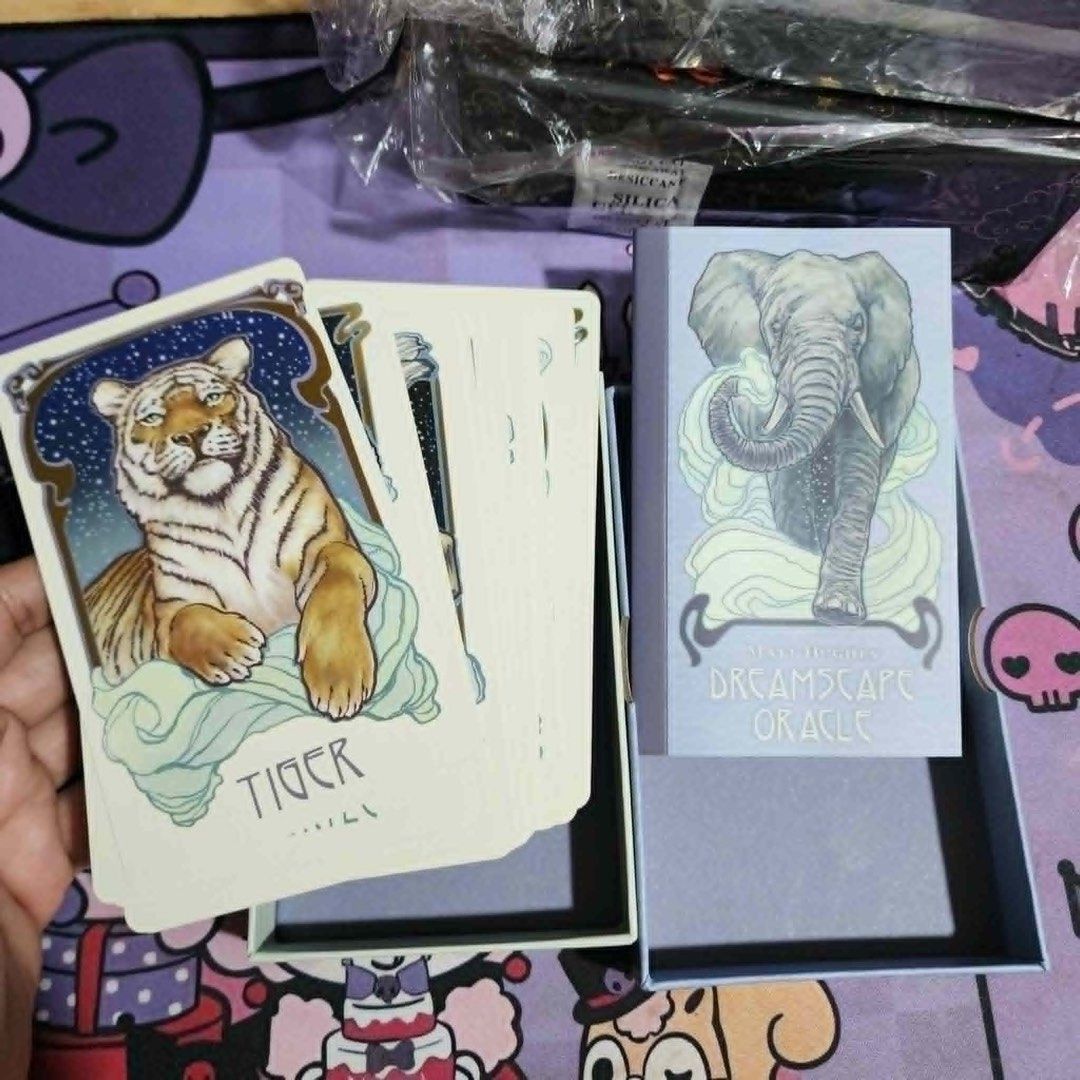 Dreamscape oracle by matt hughs (Category: Raw Singles) located in Las Pinas. Submitted by juuzzmeeh2021 (Listing ID 1458205088, Image 1). Description: Dreamscape Oracle by Matt Hughes - 32 cards. Each card is illuminated with gold foil -OPENED but never used(collection), Same as New .