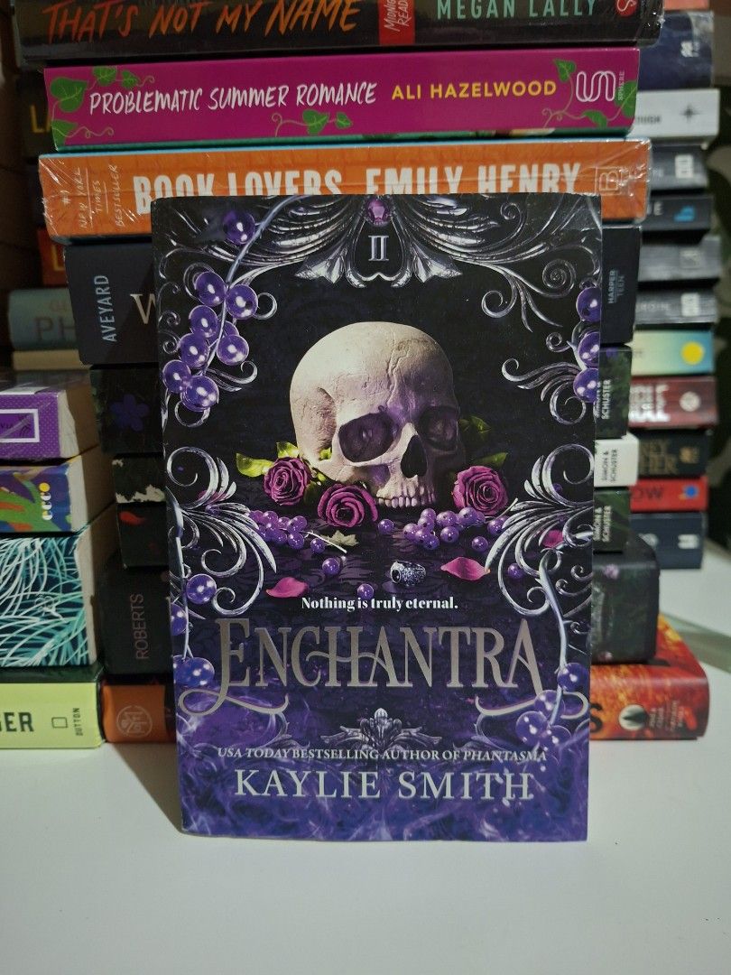 Enchantra by Kaylie Smith Book 1 (Category: Storybooks) located in Baguio. Submitted by favebookread (Listing ID 1458272289, Image 1). Description: - Enchantra, Book 1 by Kaylie Smith - USA Today bestselling author of Phantasma - Features a striking skull and floral design - Theme: Nothing is truly eternal - Great addition to your fantasy or romance collection - Other books available: 'Problematic Summer Romance' by Ali Hazelwood and 'Book Lovers
