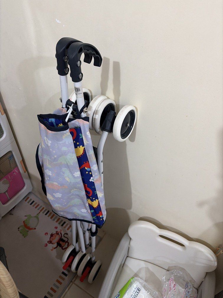 ENFANT Baby Stroller with Dinosaur Print (Category: Strollers) located in Pasig City. Submitted by dotestrada (Listing ID 1453459093, Image 2). Description: - Lightweight and easy to fold/carry - Fun dinosaur print canopy - Built-in sunshade for sun protection - Smooth-rolling wheels for easy maneuvering - Ideal for toddlers and quick outings.