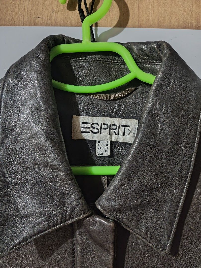 Esprit Leather Jacket (Category: Coats, Jackets and Outerwear) located in Makati City. Submitted by elirei (Listing ID 1458124520, Image 3). Description: - Esprit brown leather jacket - Classic collar and button-up front - Two side pockets - Estimated size L - Ideal for cooler weather - Versatile addition to any wardrobe -Real leather nice fit when worn, also idk why it's too textured in the photo perp it looks nice in person.