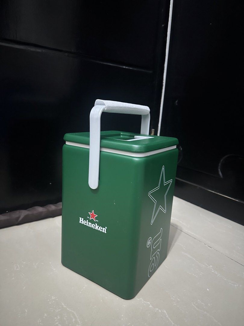 Exclusive Heineken Cooler Box (Category: Food Organization & Storage) located in Manila. Submitted by shoplie (Listing ID 1458287823, Image 1). Description: Size: 25 x 15.5 x 16 cm Classic green Heineken cooler box. Great for parties and keeping drinks cold! Lid also features four circular indentations for cans or cups :) .