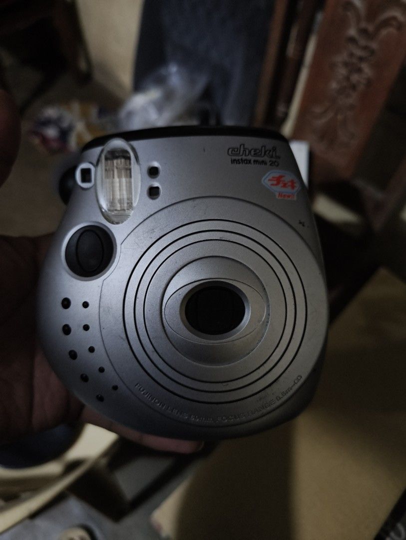 Fujifilm Instax Mini 20 Silver Instant Camera (Category: Cameras) located in Bauang. Submitted by jerwinpere15921 (Listing ID 1458224078, Image 1). Description: - Fujifilm Instax Mini 20 instant camera - Shows minor scuffs from normal use untested no cr2 battery as is .
