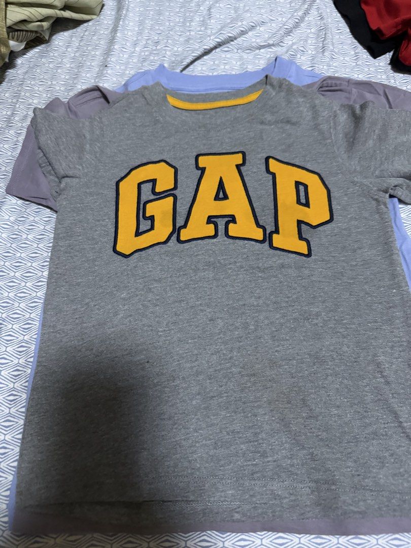 GAP and CK Bundle (Category: Babies & Kids Fashion) located in Pasig City. Submitted by fancytracy (Listing ID 1458159056, Image 1). Description: Bundle of 3 Shirts Gap, Gap, CK Armpit to armpit 13.5 inches.