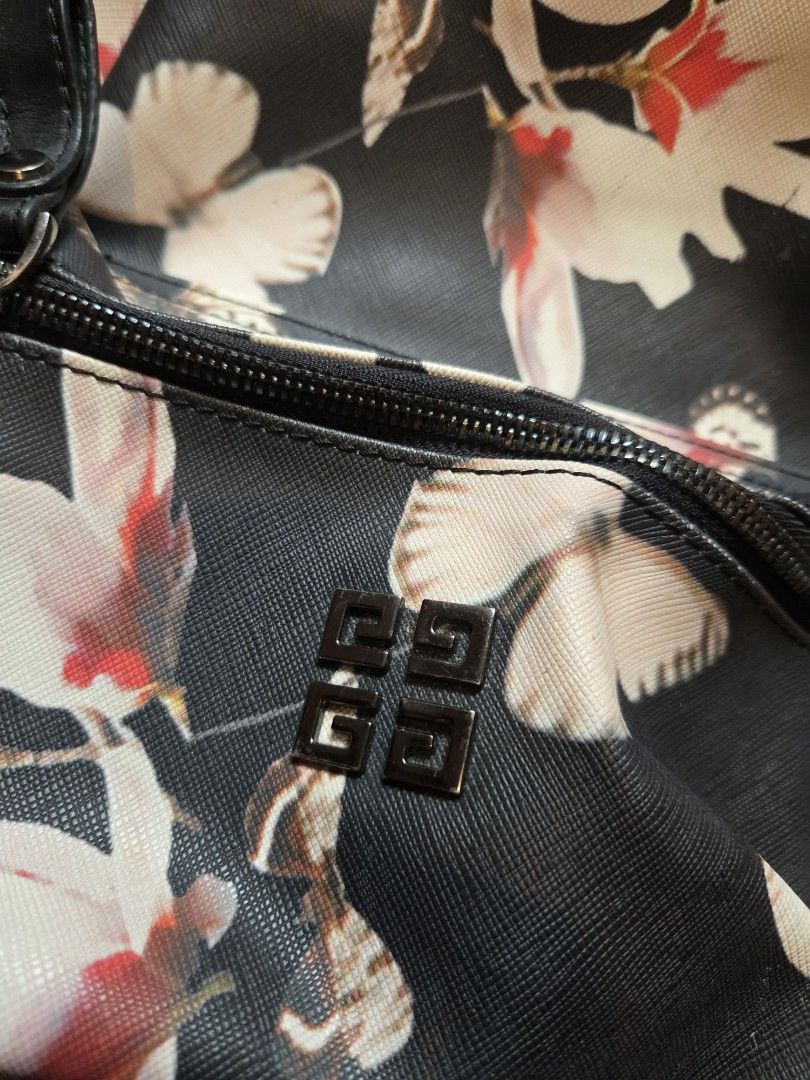 Givenchy Floral Mini backpack (Category: Luxury Bags & Wallets) located in Rizal. Submitted by stoo_cee (Listing ID 1458164034, Image 2). Description: G*venchy Mini Backpack 9.2/10 issue: scratches.