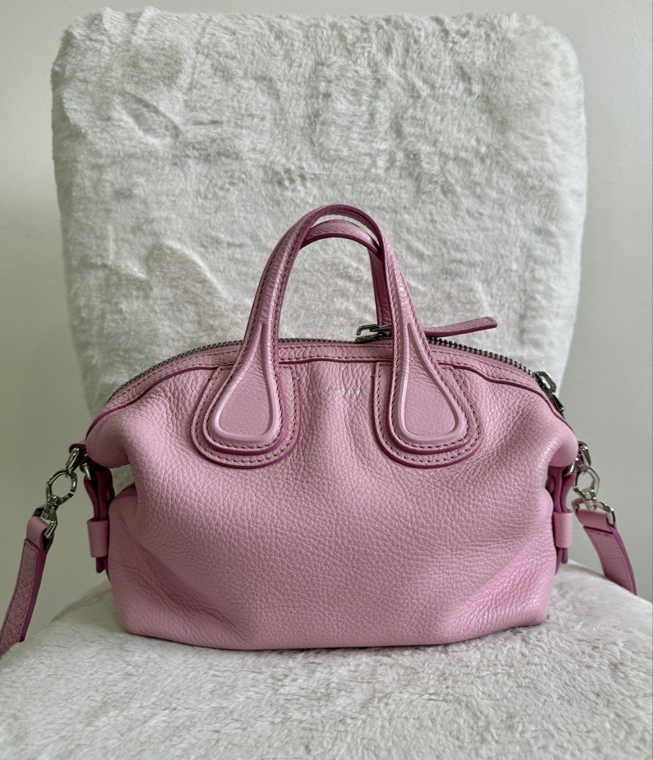 SALE Givenchy Pink Micro Nightingale (Category: Luxury Bags & Wallets) located in Quezon City. Submitted by closet24 (Listing ID 1458178656, Image 1). Description: - Authentic Givenchy Pink Micro Nightingale - Silver Hardware -Calf Leather -Sakura Pink (color very pretty in person) -Clean interior -No prominent issues/flaws/rubs -leather smells good -rare find in the market -fits promax still spacious -2 way bag (crossbody/handbag) Inclusions: Du