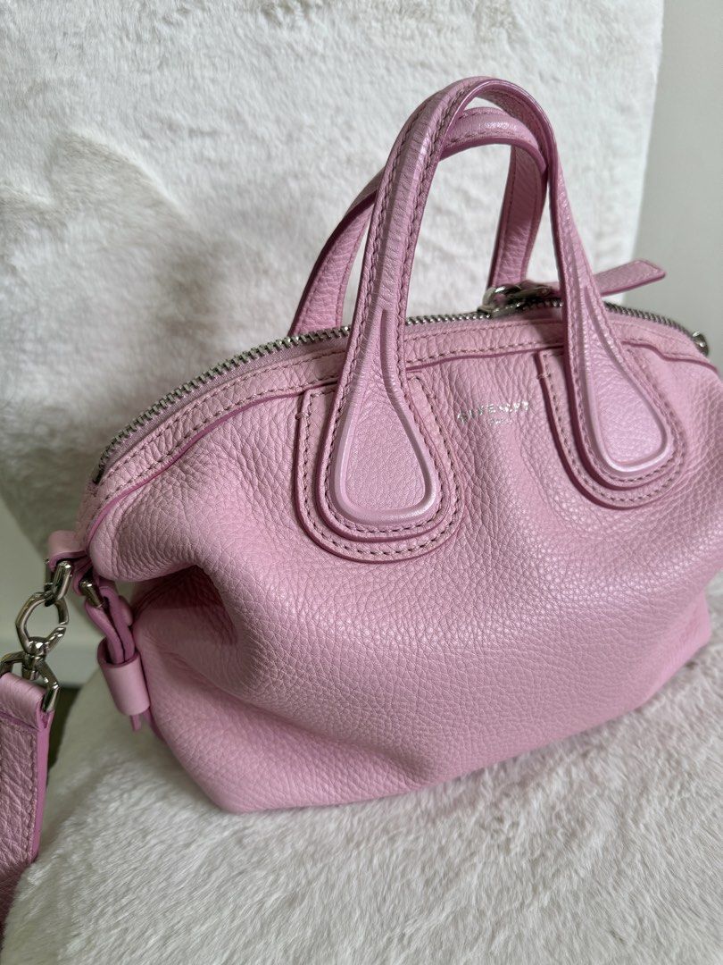 SALE Givenchy Pink Micro Nightingale (Category: Luxury Bags & Wallets) located in Quezon City. Submitted by closet24 (Listing ID 1458178656, Image 2). Description: - Authentic Givenchy Pink Micro Nightingale - Silver Hardware -Calf Leather -Sakura Pink (color very pretty in person) -Clean interior -No prominent issues/flaws/rubs -leather smells good -rare find in the market -fits promax still spacious -2 way bag (crossbody/handbag) Inclusions: Du