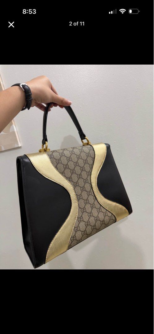 Gucci Tiger Head Monogram Handbag (Category: Luxury Bags & Wallets) located in Batangas. Submitted by c.lyns (Listing ID 1458243292, Image 2). Description: - Classic Gucci monogram handbag - Black leather with gold accents - Iconic tiger head clasp closure - Interior zip pocket - Detachable chain strap - Versatile for day or night use -Used but in very good condition -With cert of authenticity and gucci dustbag -Gucci chain handle -Hardwares are 
