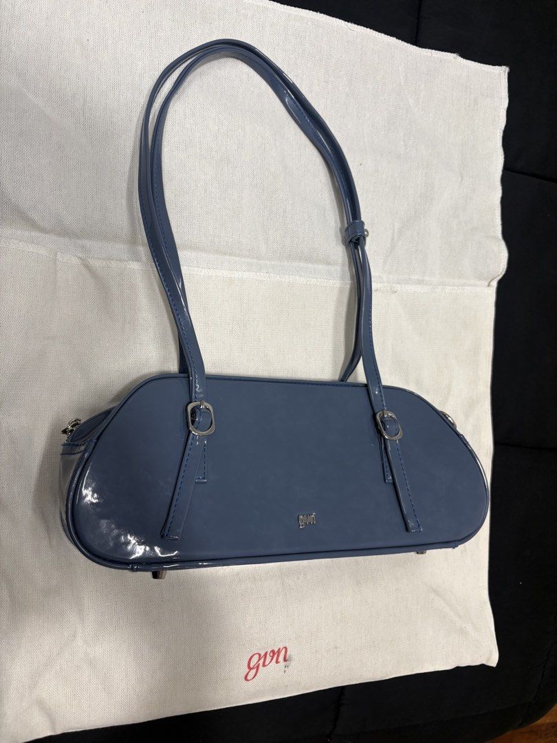 GVN Patent Leather Baguette Bag (Category: Shoulder Bags) located in Manila. Submitted by mjmendoza228523 (Listing ID 1458097637, Image 3). Description: Practically New GVN Baguette Bag in Patent Leather (Denim). Chic, structured. Very pretty, but haven’t been able to use for a while. Rehoming this beauty. RFS: Too many bags, Decluttering MOP: GCash, Bank Transfer to BPI Shipping: Lalamove is preferred, but can do J&T. Shipping is handled by buye