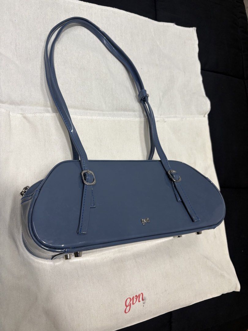 GVN Patent Leather Baguette Bag (Category: Shoulder Bags) located in Manila. Submitted by mjmendoza228523 (Listing ID 1458097637, Image 2). Description: Practically New GVN Baguette Bag in Patent Leather (Denim). Chic, structured. Very pretty, but haven’t been able to use for a while. Rehoming this beauty. RFS: Too many bags, Decluttering MOP: GCash, Bank Transfer to BPI Shipping: Lalamove is preferred, but can do J&T. Shipping is handled by buye