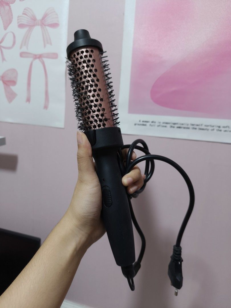 Ubeator Hair curler (Category: Hair) located in Manila. Submitted by lynnn_. (Listing ID 1458215645, Image 1). Description: - Effortlessly style your hair with a rotating barrel for added volume and smooth, sleek locks. - Features firm bristles for effective styling. - Ergonomic design ensures a comfortable and easy grip for hassle-free use. - Comes with a conveniently long cord for ample reach. - Perfect for achieving quick and beautiful blowout