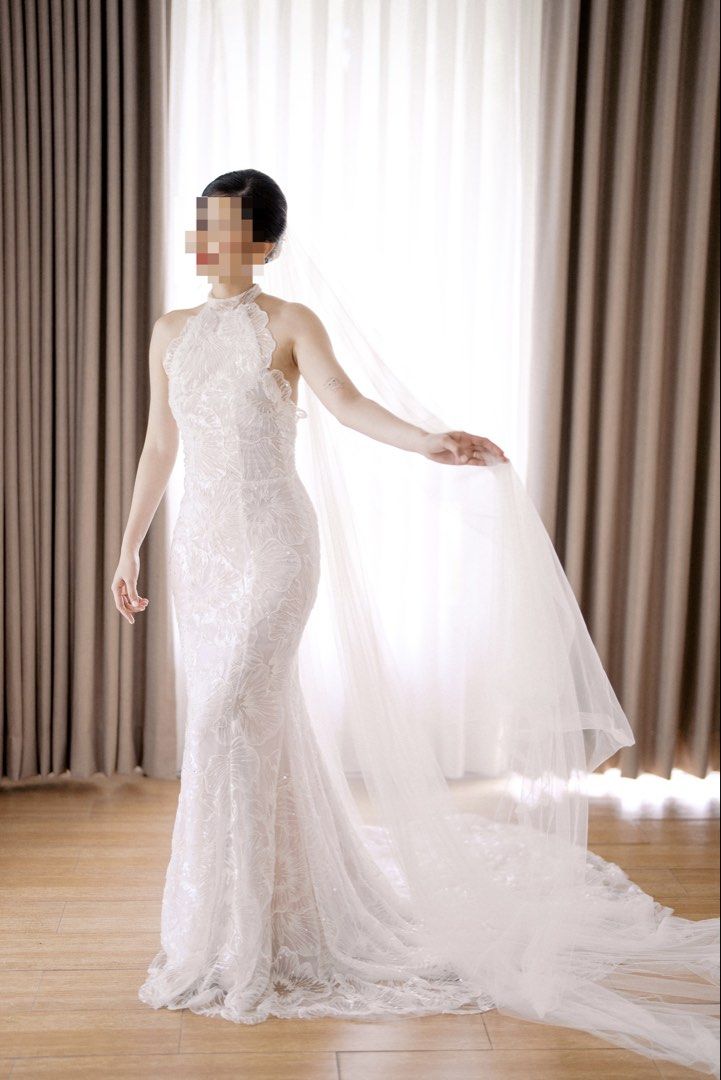 Halter wedding gown (Category: Evening dresses & gowns) located in Mandaluyong City. Submitted by helpmedeclutterplith (Listing ID 1458181807, Image 1). Description: Used wedding gown, Custom-made by Patricia Pascual Designs. Preferably for a petite bride/body type ✨ Original price: ₱52,000 Selling price: ₱25,000 Just a few things to note about the gown: • Top sides: The lace on the sides is soft and doesn’t have a stiff structure, so you may nee