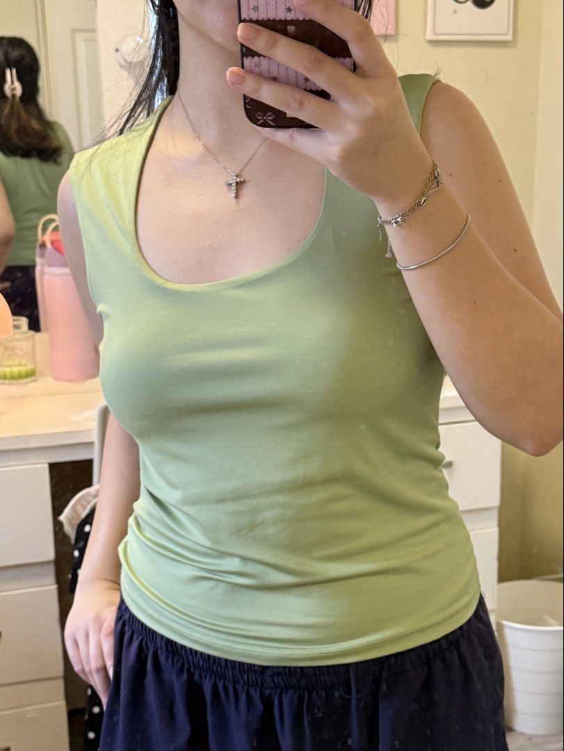 H&M ligh green microfiber sleeveless top (Category: Sleeveless) located in Bacolor. Submitted by alysaflrs (Listing ID 1458164308, Image 2). Description: ★ never worn ★ size M ★ check the size guide in the photos ★ details: low cut neckline, round neck.