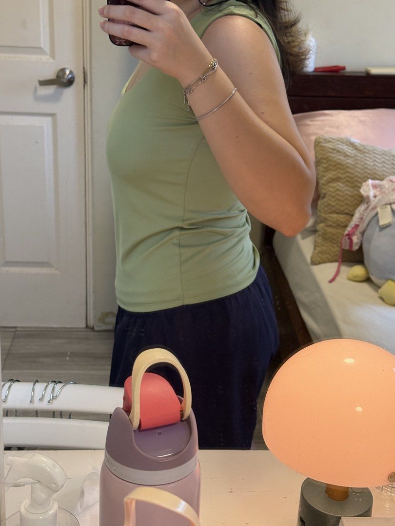 H&M ligh green microfiber sleeveless top (Category: Sleeveless) located in Bacolor. Submitted by alysaflrs (Listing ID 1458164308, Image 3). Description: ★ never worn ★ size M ★ check the size guide in the photos ★ details: low cut neckline, round neck.