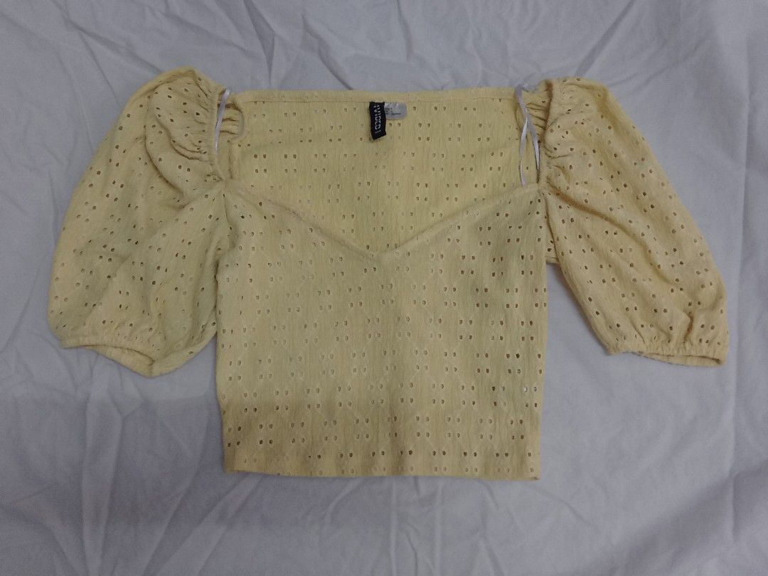 H&M Yellow Puff Sleeves Eyelet Top (Category: Blouses) located in Manila. Submitted by shop.airens (Listing ID 1458145105, Image 1). Description: fits xs-small.