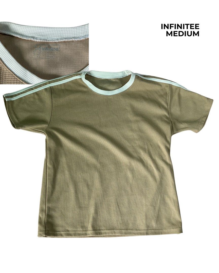 INFINITEE T-shirt Medium Khaki Waffle Knit (Category: Tshirts & Polo Shirts ) located in Narvacan. Submitted by liusaidh (Listing ID 1458147131, Image 1). Description: - Brand: INFINITEE - Style: Waffle Knit T-Shirt - Color: Khaki - Size: Medium - Details: Light blue trim on collar and sleeves - Occasion: Casual wear.