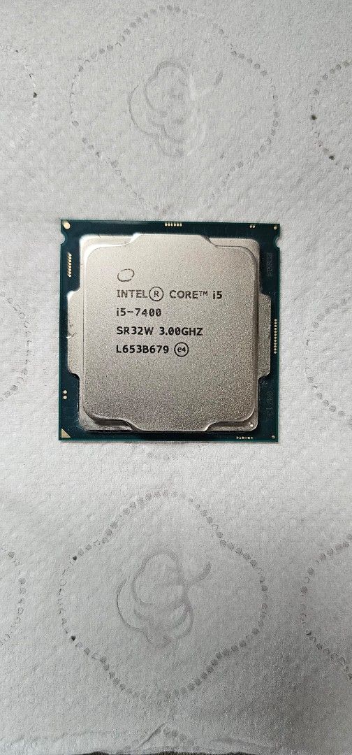 Intel Core i5-7400 SR32W 3.00GHz CPU Processor (Category: Computer Parts) located in Caloocan City. Submitted by yanom (Listing ID 1458118197, Image 2). Description: - Intel Core i5-7400 Processor - Model: SR325W - Clock Speed: 3.00GHz - Condition: Tested and working - Ideal for new PC builds or upgrades.