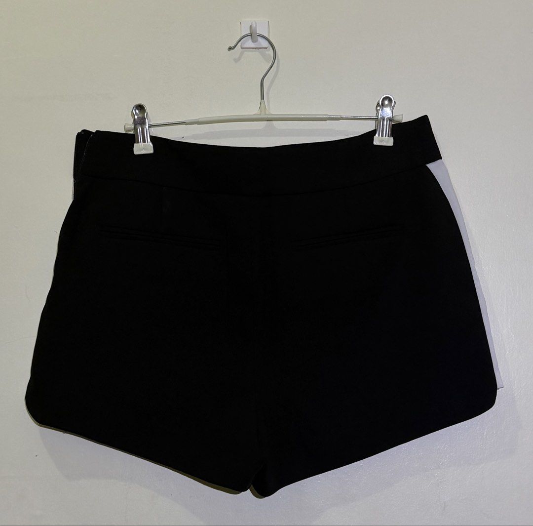 J. Crew Black Shorts with White Side Stripe (Category: Shorts) located in Cavite. Submitted by maxs.bl (Listing ID 1458143380, Image 3). Description: - Brand: J. Crew - Color: Black - Feature: White stripe down each side - Closure: Side zipper - Pockets: Two back pockets - Style: Versatile for casual or dressed-up occasions.