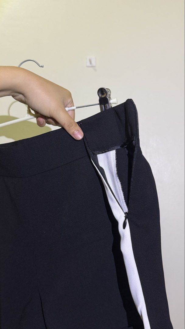 J. Crew Black Shorts with White Side Stripe (Category: Shorts) located in Cavite. Submitted by maxs.bl (Listing ID 1458143380, Image 2). Description: - Brand: J. Crew - Color: Black - Feature: White stripe down each side - Closure: Side zipper - Pockets: Two back pockets - Style: Versatile for casual or dressed-up occasions.