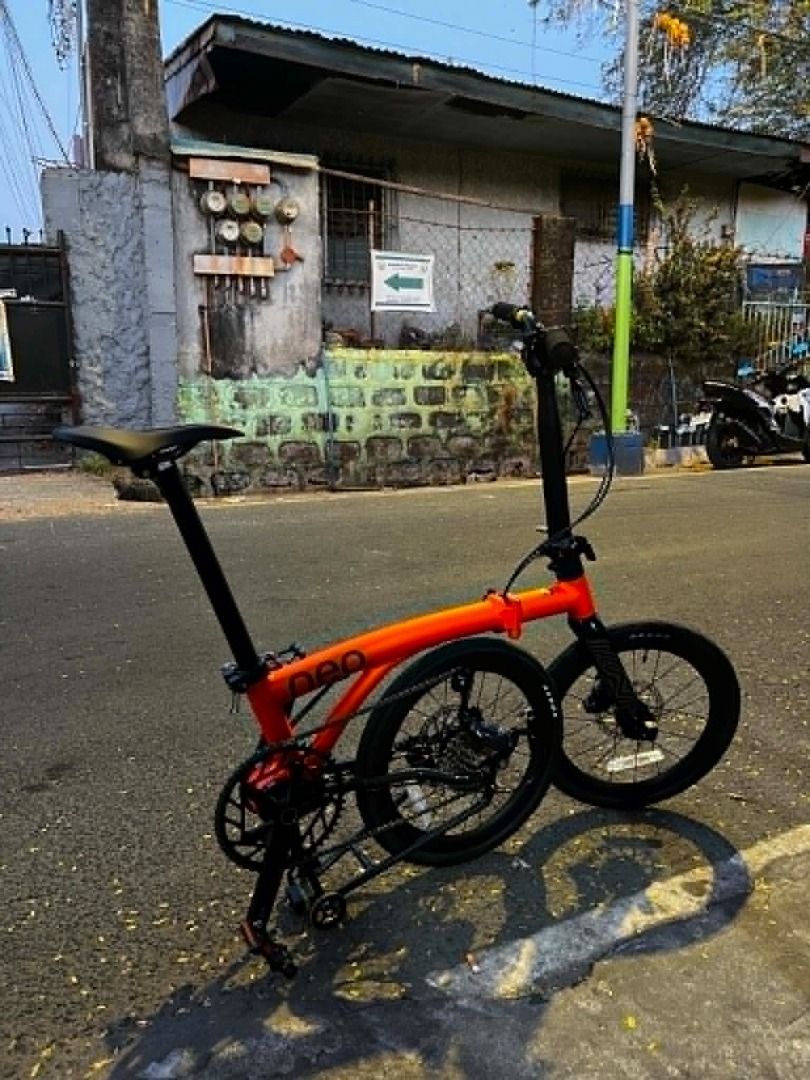 Java Neo 3 16inch Tri Fold (Category: Bicycles) located in Caloocan City. Submitted by redondojas26373 (Listing ID 1458160741, Image 3). Description: - Orange folding bike - 16-inch wheels - Front and rear disc brakes - Lightweight and portable - Ideal for commuting and casual rides - Ready for a new owner LOCATION : IMUS/ KAWIT CAVITE IF SHIPPING: LBC/ LALAMOVE Contact # 09669939326 ( if di online dito ) .