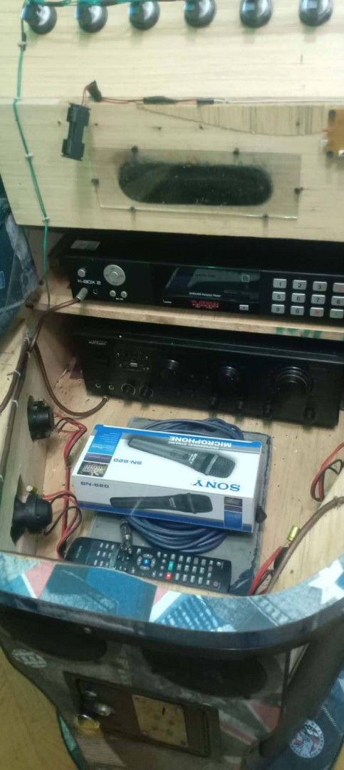 Karaoke Machine with Screen, Amplifier, and Microphone (Category: Soundbars, Speakers & Amplifiers) located in Manila. Submitted by wisegem-231b (Listing ID 1458221548, Image 1). Description: - Complete karaoke setup - Includes screen, amplifier, and Sony professional dynamic microphone - Comes with remote control - Ready for parties and gatherings - All components in a custom cabinet with built-in speakers - Plug and play for easy setup.