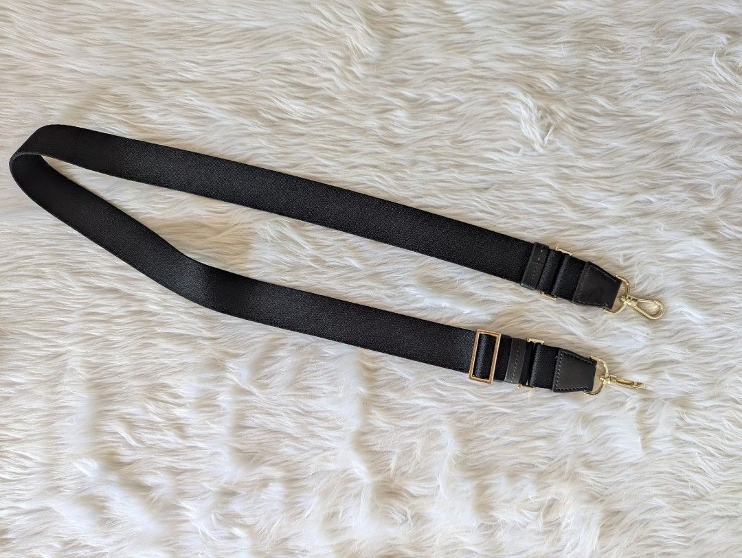 Kate Spade Black Fabric & Leather Bag Strap Gold Hardware (Category: Cross-body Bags) located in Manila. Submitted by eladp (Listing ID 1458212967, Image 2). Description: - Adjustable black fabric strap with leather accents - Gold-tone hardware with swivel clasps at each end - Perfect for customizing your favorite bag - Approximately 45 inches when fully extended - Clean and ready for a new owner.