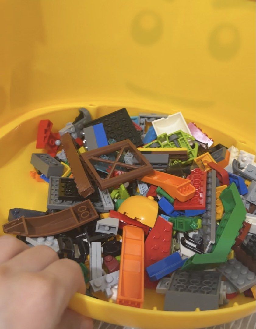 Lego (Category: Storage Boxes & Baskets) located in Taytay. Submitted by welloveditems (Listing ID 1458294929, Image 3). Description: - Large yellow Lego head storage container - Includes a good amount of assorted Lego pieces - Fun and practical way to organize Lego bricks - Lid opens to reveal ample storage space - Ideal for kids and Lego enthusiasts.
