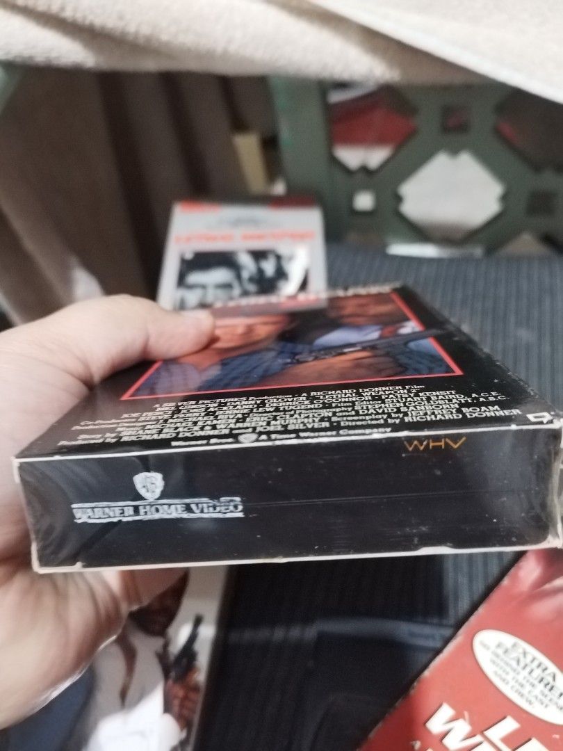 Lethal Weapon 1-4 VHS Movie Collection (Category: CDs & DVDs) located in Manila. Submitted by pickerjessie (Listing ID 1458223722, Image 3). Description: -Complete Lethal Weapon VHS Series (1, 2, 3, & 4) - Iconic action movies starring Mel Gibson and Danny Glover - Perfect for collectors or fans of 80s/90s action - All VHS tapes are in their original cases - Relive these classic buddy-cop thrillers!.