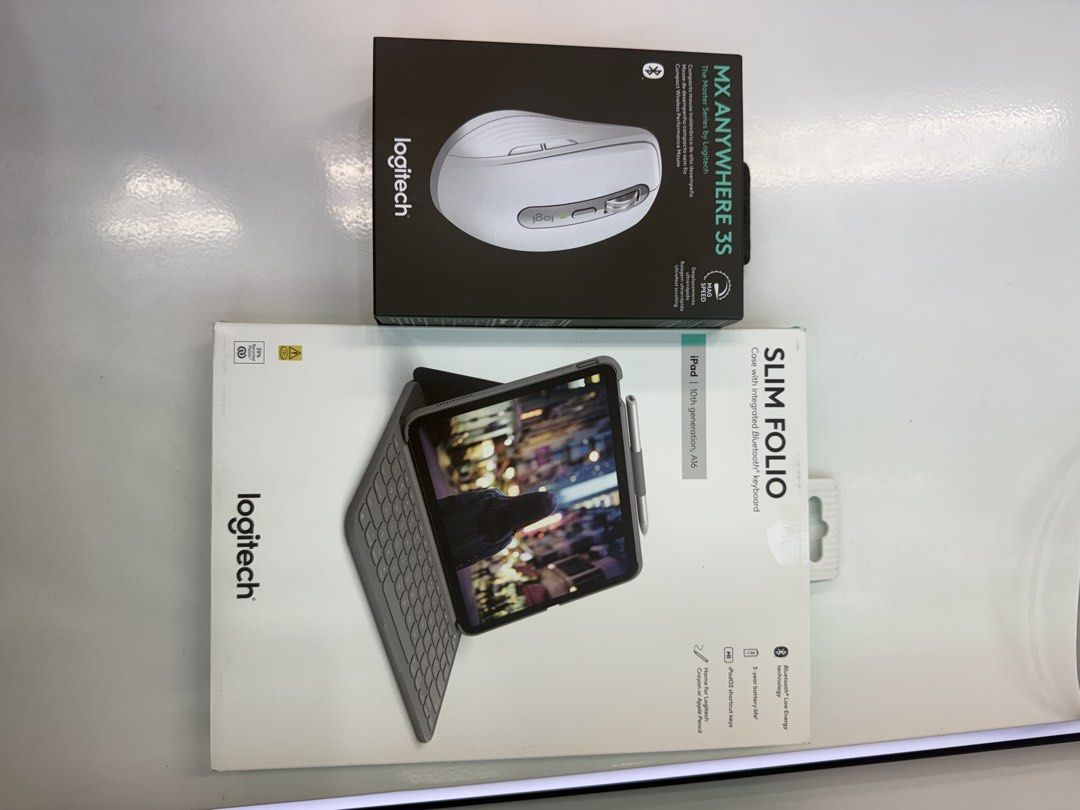 Logitech MX Anywhere 3S Mouse & Slim Folio Keyboard Case (Category: Computer Keyboard) located in Mandaluyong City. Submitted by mhaldita062824 (Listing ID 1458135380, Image 1). Description: - Brand New Logitech MX Anywhere 3S Mouse (Pale Grey) - Compact and portable for on-the-go use. - Brand New Logitech Slim Folio Keyboard Case for iPad 10th Gen - Features full-size keys and a trackpad for enhanced productivity. - Ideal for professionals and s