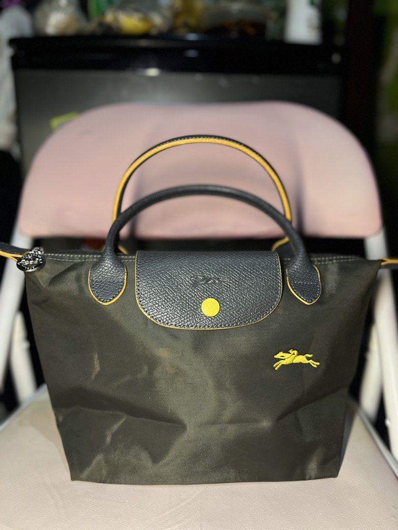 Longchamp set small and mini with sling (Category: Luxury Bags & Wallets) located in Cebu City. Submitted by luv.vintage (Listing ID 1458187915, Image 2). Description: mini sling (OG) good condition small tote (not OG) with signs of usage.