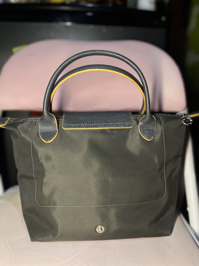 Longchamp set small and mini with sling (Category: Luxury Bags & Wallets) located in Cebu City. Submitted by luv.vintage (Listing ID 1458187915, Image 3). Description: mini sling (OG) good condition small tote (not OG) with signs of usage.