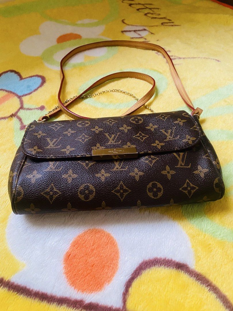 Louis Vuitton favorite (Category: Luxury Bags & Wallets) located in San Jose del Monte. Submitted by cityhanter007 (Listing ID 1458156429, Image 3). Description: - Classic Louis Vuitton monogram canvas crossbody bag - some tarnish/fading on hardware - Burgundy fabric interior with a small pocket - Leather and chain combination strap - coded -yung magnet lock nya di na masyado madikit .