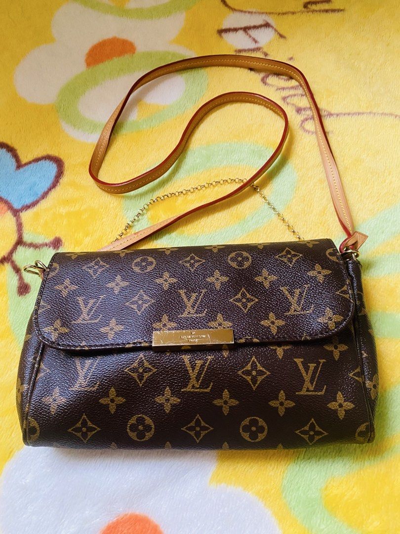 Louis Vuitton favorite (Category: Luxury Bags & Wallets) located in San Jose del Monte. Submitted by cityhanter007 (Listing ID 1458156429, Image 1). Description: - Classic Louis Vuitton monogram canvas crossbody bag - some tarnish/fading on hardware - Burgundy fabric interior with a small pocket - Leather and chain combination strap - coded -yung magnet lock nya di na masyado madikit .