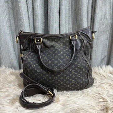 Louis Vuitton Monogram Canvas Shoulder Bag (Category: Luxury Bags & Wallets) located in Manila. Submitted by cacador2177395 (Listing ID 1458145827, Image 1). Description: - Authentic Louis Vuitton shoulder bag - Dark brown monogram canvas with leather trim - Gold hardware details - Adjustable shoulder strap - Spacious interior - Ideal for daily use.