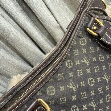 Louis Vuitton Monogram Canvas Shoulder Bag (Category: Luxury Bags & Wallets) located in Manila. Submitted by cacador2177395 (Listing ID 1458145827, Image 3). Description: - Authentic Louis Vuitton shoulder bag - Dark brown monogram canvas with leather trim - Gold hardware details - Adjustable shoulder strap - Spacious interior - Ideal for daily use.