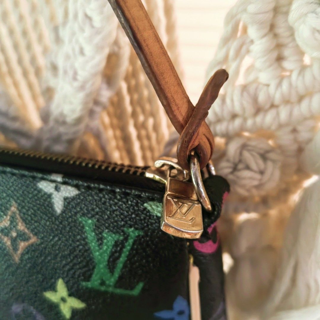 Louis Vuitton Monogram Multicolore Pochette (Category: Luxury Bags & Wallets) located in Davao. Submitted by gelleevanelli (Listing ID 1458156082, Image 3). Description: *Louis Vuitton Monogram Multicolor Pochette * - this is THE collector's piece! *Bag Details from photos:* *Model*: LV Pochette Accessoires - Monogram Multicolor "Noir" *Era*: 2003-2015 - iconic collaboration - *Color*: Black base with 33 rainbow colors. This is the "Noir" colorwa