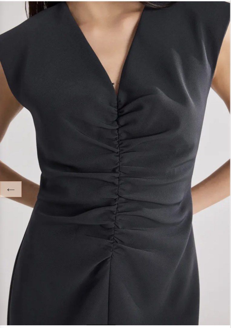 Love Bonito Dress (Category: Dresses) located in Manila. Submitted by jdddecluttersss (Listing ID 1458220525, Image 3). Description: - Elegant midi dress in dark charcoal or black. - Flattering V-neck with ruched detailing. - Structured cap sleeves. - Fabric with a subtle sheen. - Versatile for dressing up or down..