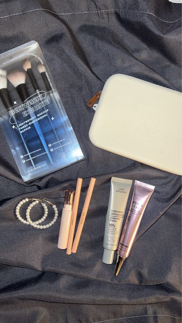 Makeup Bundle (Category: Makeup) located in Pasig City. Submitted by shop.prelovedbycza (Listing ID 1458277476, Image 1). Description: take all ₱500 • KKV makeup brush set • 2 sheglam lip liners • sheglam peel off lip stain • luxe organix whitening underarm cream • prettyskin stem cell cream • round pearl earrings • happyskin white rubber makeup bag all used a few times only buyer must shoulder shipping loc: pasig city/pasay city.