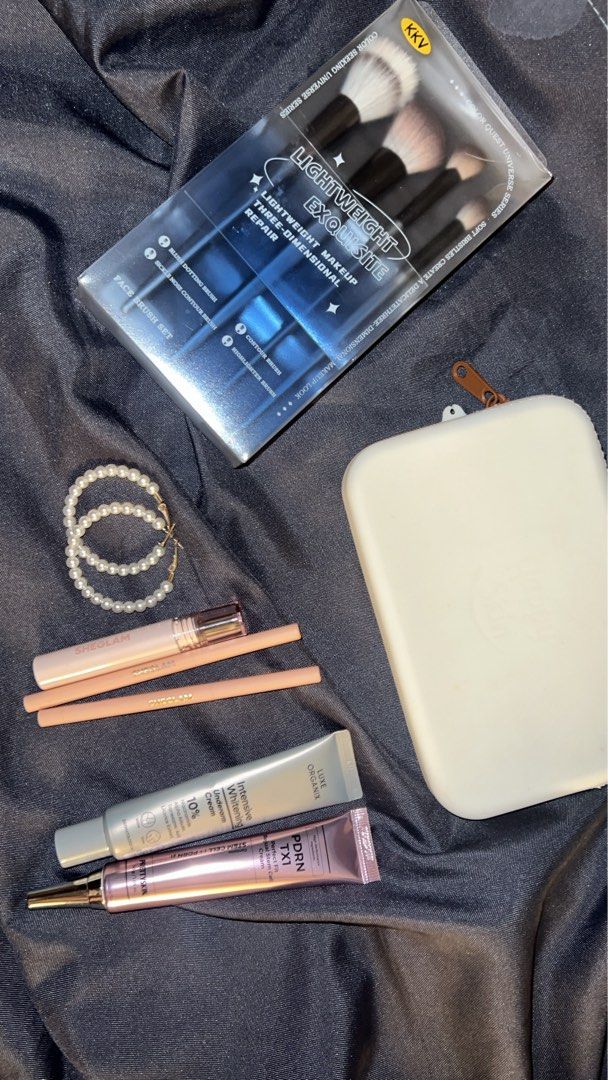 Makeup Bundle (Category: Makeup) located in Pasig City. Submitted by shop.prelovedbycza (Listing ID 1458277476, Image 2). Description: take all ₱500 • KKV makeup brush set • 2 sheglam lip liners • sheglam peel off lip stain • luxe organix whitening underarm cream • prettyskin stem cell cream • round pearl earrings • happyskin white rubber makeup bag all used a few times only buyer must shoulder shipping loc: pasig city/pasay city.