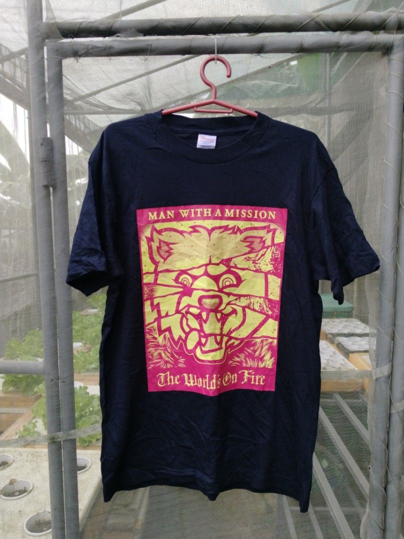 MAN WITH A MISSION (Category: Tshirts & Polo Shirts ) located in Legazpi City. Submitted by genobecollectives (Listing ID 1458105939, Image 1). Description: - MAN WITH A MISSION "The World's On Fire" Tour T-Shirt - Front features iconic tour graphic - Back displays tour dates and locations - Brand: Printstar - Material: Heavyweight Pre-Shrunk Cotton - Size: Small (S) - Ideal for fans of the band 500 free ship 20 x 27 excellent condition .