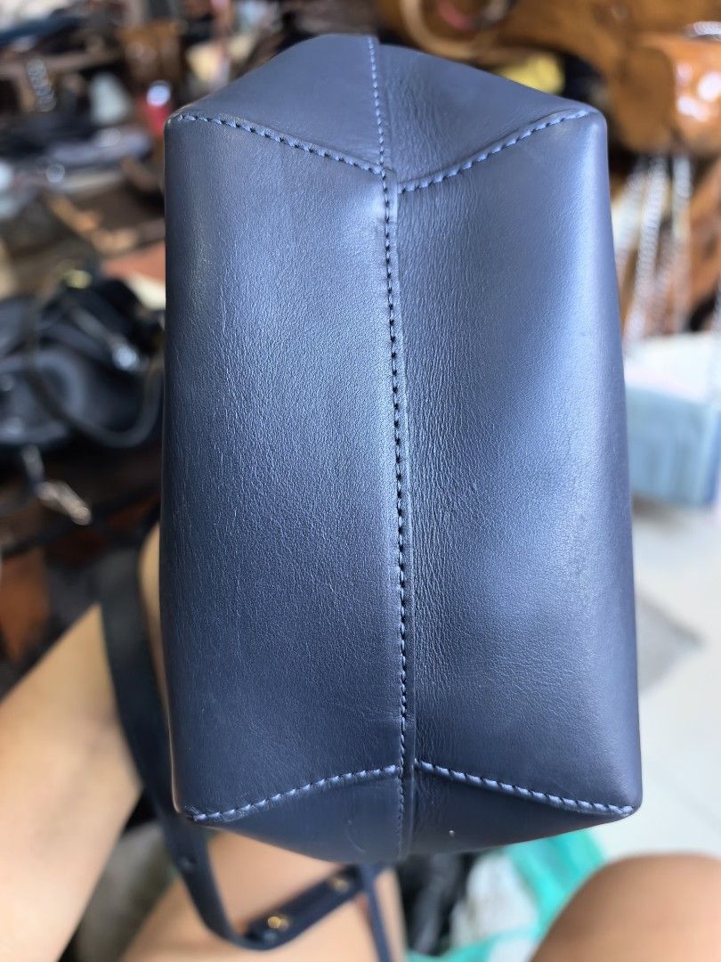 Mansur Gavriel Navy Leather Bucket Bag (Category: Luxury Bags & Wallets) located in Cagayan de Oro. Submitted by tommygurl1218 (Listing ID 1458108193, Image 2). Description: - Authentic Mansur Gavriel navy blue leather bucket bag - Secure drawstring closure - Adjustable shoulder strap with elegant gold-tone hardware - Classic, minimalist design - Ideal for everyday wear and tear With minimal sign of use .