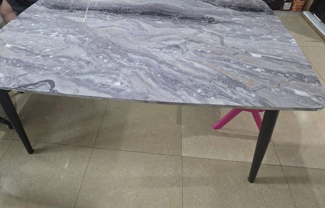 Marble Top Dining Table with Black Legs (Category: Tables & Sets) located in Manila. Submitted by epiccat_52bc0d (Listing ID 1458150813, Image 1). Description: RFS: Decluttering dahil lilipat na po ng bahay - Elegant grey marble-patterned tabletop with a smooth finish. - Sturdy black tapered legs. - Ideal size for dining areas. - Easy-to-clean surface. - Perfect for everyday meals and entertaining guests. 📌Price is still negotiable For more defa
