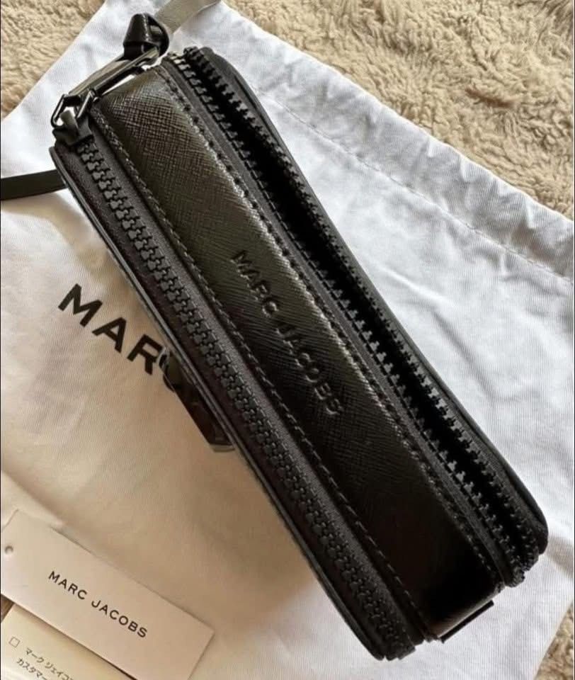 Marc Jacobs Bag (Category: Camera Bags & Carriers) located in Quezon City. Submitted by liezl.marie (Listing ID 1458243387, Image 3). Description: The Snapshot Bag by M@rc Jac0bs - Unused 12,500 Open for layaway. Disclaimer: We are not affiliated, associated, authorized, endorsed by or in any way officially connected with any other company or luxury brand. All copyrights are reserved to the original brand..