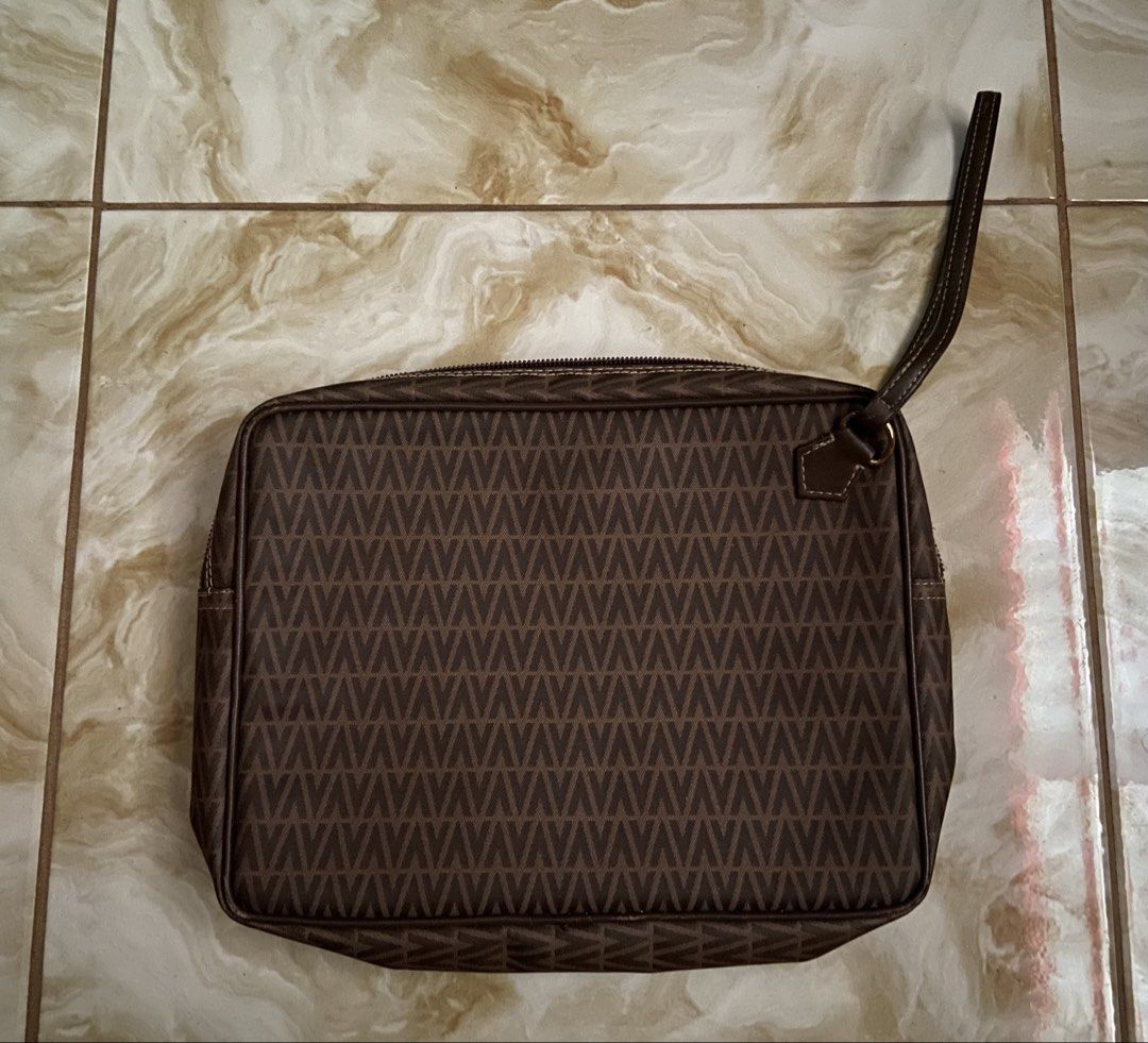 Mario Valentino Pouch (Category: Luxury Bags & Wallets) located in Aroroy. Submitted by mahinaanlangs (Listing ID 1458122823, Image 2). Description: Mario Valentino Pouch Legit Excellent Condition 700+Sf.