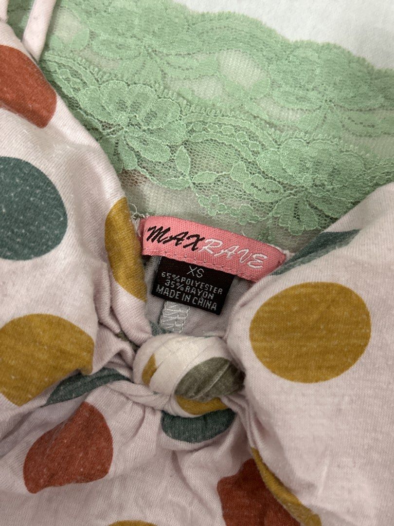 Max Rave Polka Dot Nightgown XS (Category: Dresses) located in Manila. Submitted by zencharm (Listing ID 1458131697, Image 2). Description: - Adorable pink nightgown with colorful polka dots - Features a charming green lace trim at the hem - Adjustable spaghetti straps for a perfect fit - Cute tie detail at the front - Made from a comfortable polyester and rayon blend - Ideal for cozy nights and relaxed lounging.