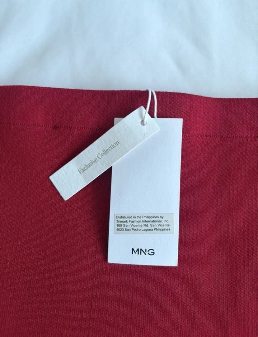 MNG Red Knit A-Line Mini Skirt (Category: Skirts) located in Manila. Submitted by chiiisells_ (Listing ID 1458290031, Image 2). Description: - MNG Red Knit Skirt - A-line cut - Mini length - Brand new with original tags - Comfortable knit material - Perfect for dressing up or down.