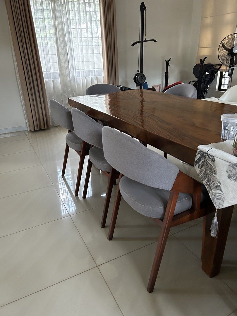 Modern Grey Upholstered Dining Chair with Solid Wooden Frame (Category: Chairs) located in Antipolo. Submitted by vsioson (Listing ID 1458218056, Image 3). Description: Elegant & Sturdy Solid Wood Dining Chairs ✨ 8 Dining Chairs Available 💰 ₱3,800 each 8 chairs available — can be sold as whole set or by twos or fours. Well-maintained and in good condition Recently deep-cleaned and ready to use! 🪑 Solid wood construction 🤍 Classic grey fabric u